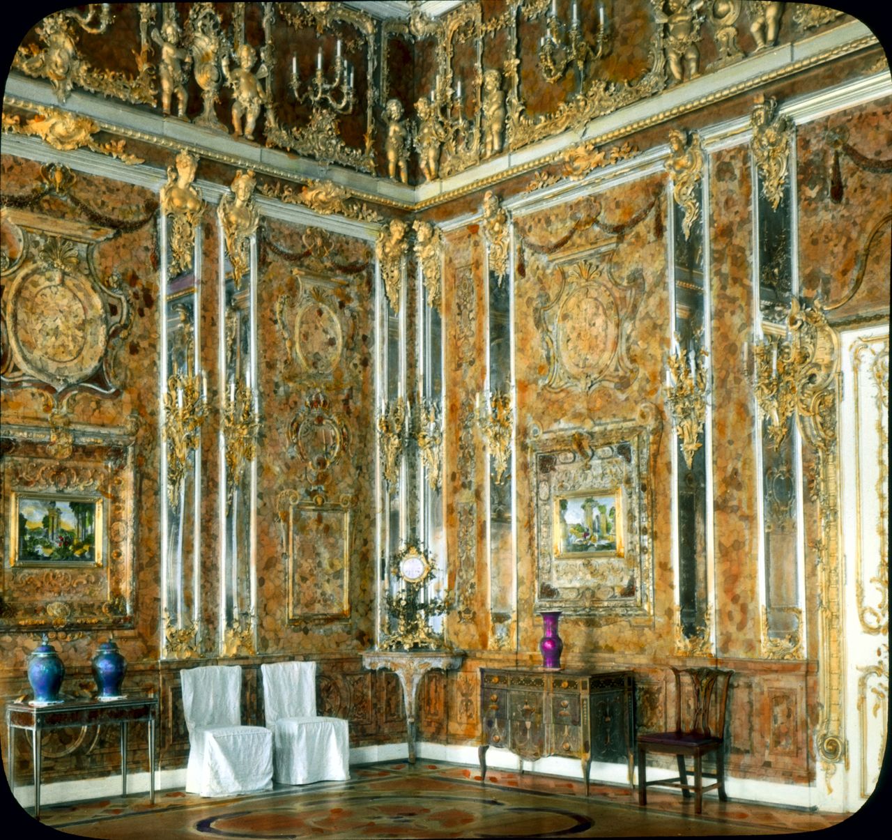 A hand-colored photograph from 1917 of the Amber Room in Russia's Catherine Palace. The ornate furnishings and artworks are estimated to be worth up to $500 million today.