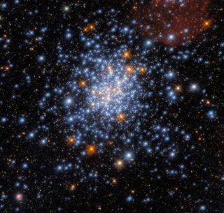 This Hubble Space Telescope image shows the brilliant open star cluster NGC330 in the Small Magellanic Cloud based on archived observations from 2018.