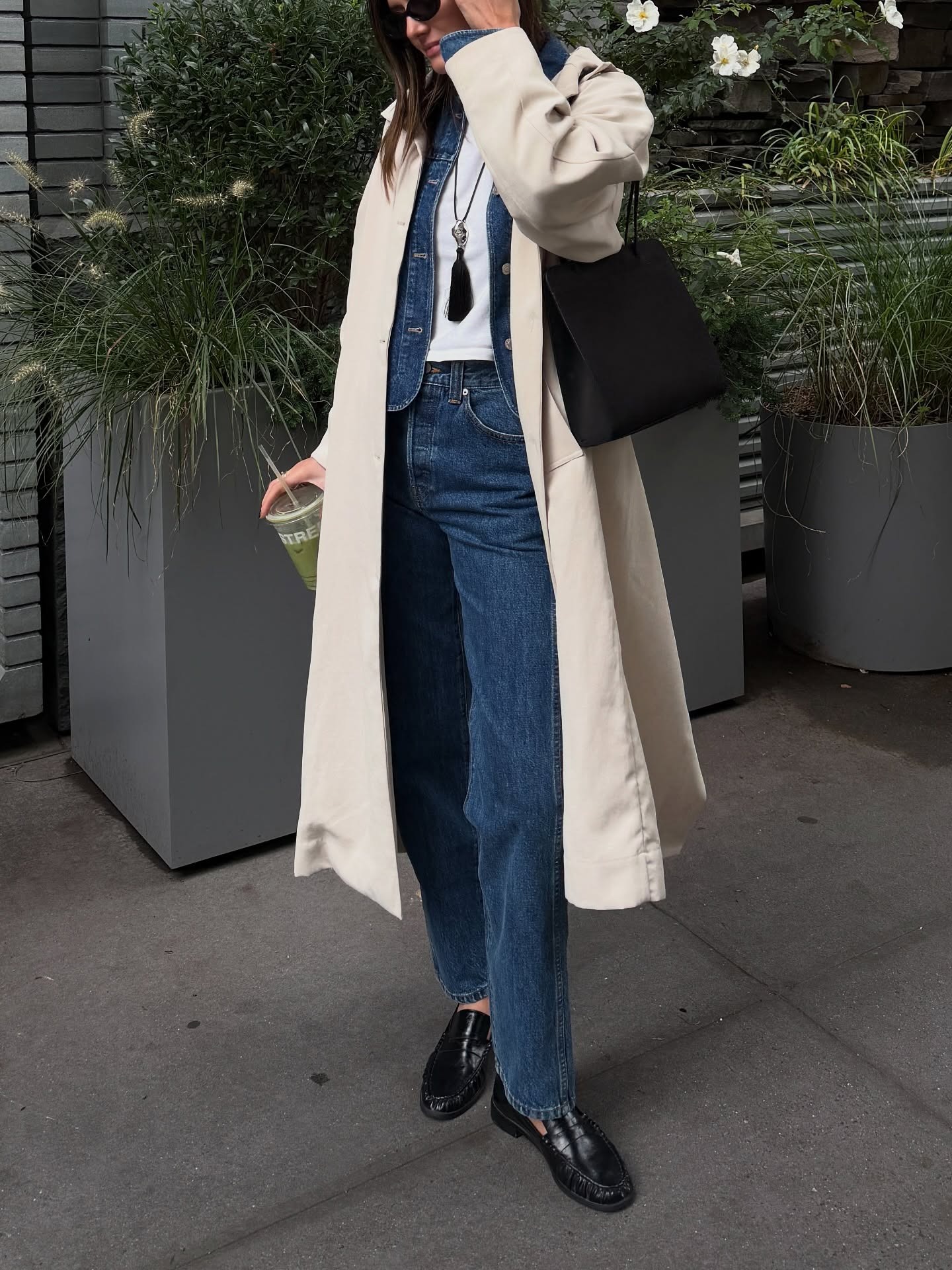 @cocoschiffer in loafers, jeans, and trench.