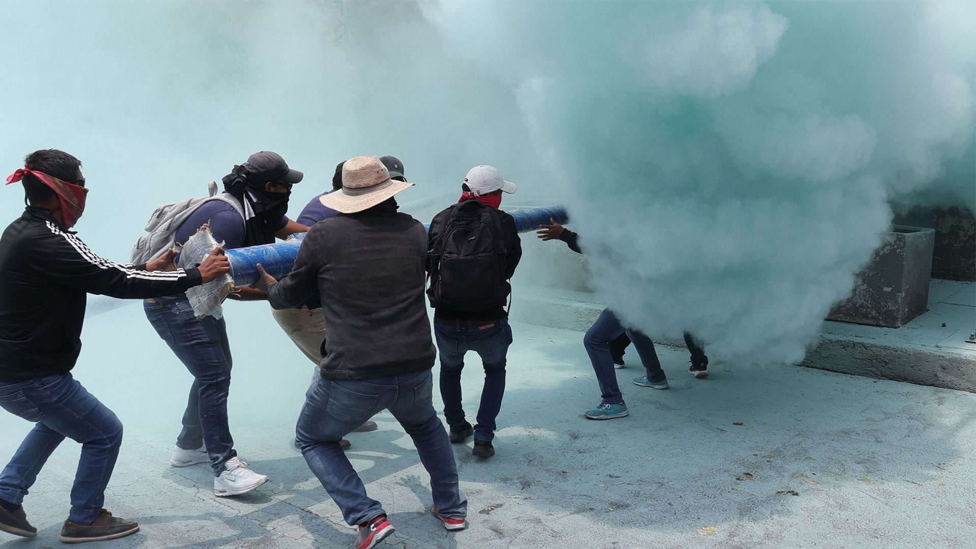 
                                Police deploy tear gas during a demonstration of the National Coordinator of Education Workers in Mexico City, Mexico
                            