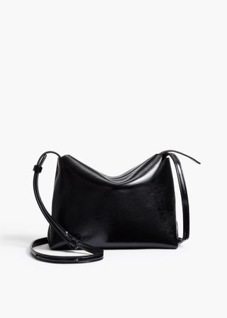 Khaite, Lina Crossbody Bag in Black Crackle Patent Leather