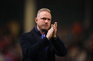 Jonas Eidevall, Head Coach of Arsenal applauds fans after the UEFA Women's Champions League match between FC Bayern München and Arsenal FC at FC Bayern Campus on October 09, 2024 in Munich, Germany.