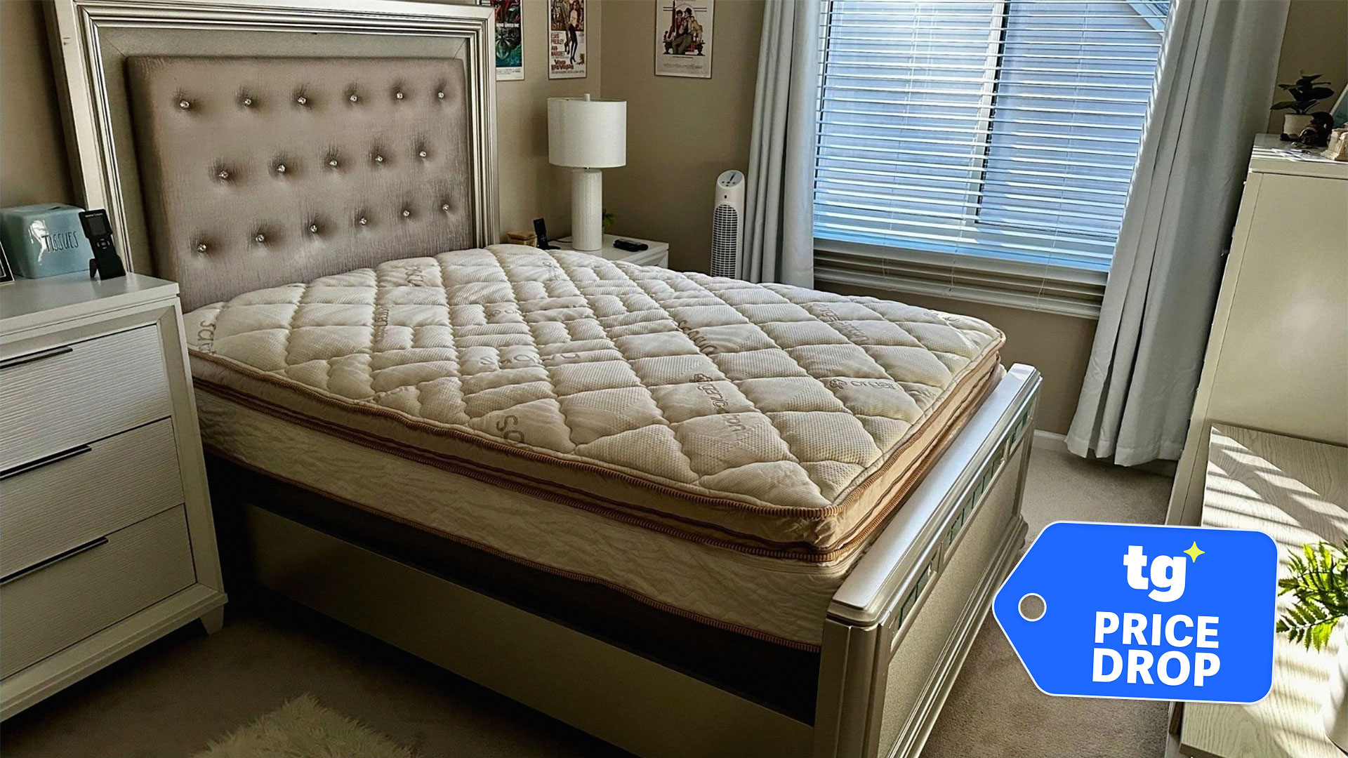 The Saatva Solaire Adjustable Mattress in a bedroom, with a Tom's Guide badge overlaid saying "PRICE DROP"