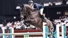 Tim Gredley clears a jump on Imperial HBF in the World Cup class at Basel, Switzerland.