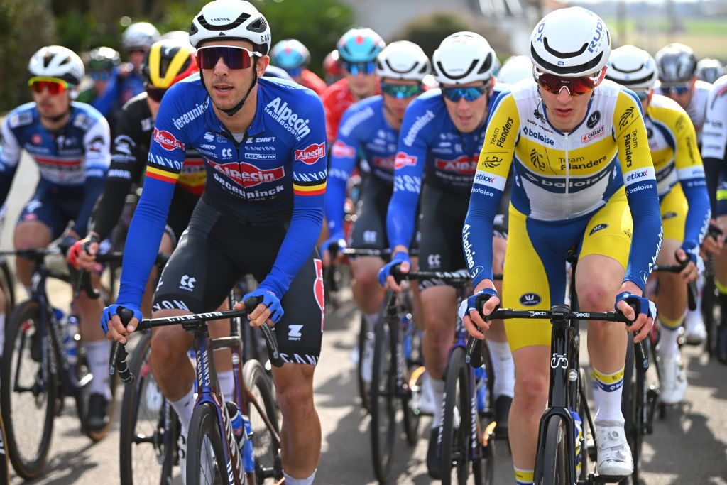 DEINZE BELGIUM MARCH 15 LR Dries De Bondt of Belgium and Team AlpecinDeceuninck and Vincent Van Hemelen of Belgium and Team Flanders Baloise compete during the 77th Danilith Nokere Koerse 2023 Mens Elite a 1936km one day race from Deinze to Nokere DanilithNokereKoerse on March 15 2023 in Deinze Belgium Photo by Luc ClaessenGetty Images