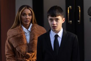 Goldie McQueen with Bobby in Hollyoaks outside the court.