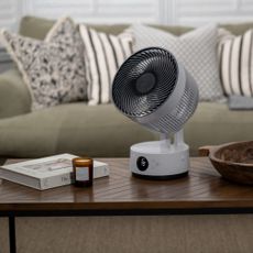 meaco sefte 8 portable fan on a coffee table in a living room