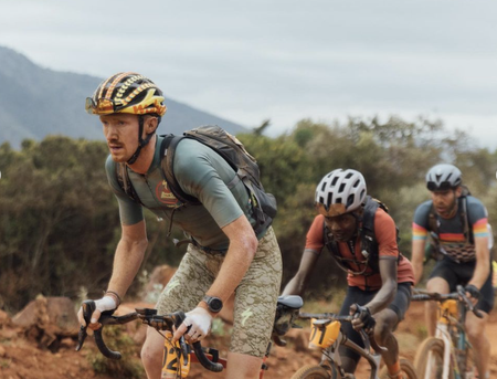 Laurens ten Dam shown behind Ian Boswell on stage 2