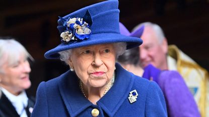 The Queen walking stick - attends a service of Thanksgiving to mark the centenary of The Royal British Legion at Westminster Abbey on October 12, 2021 in London, England