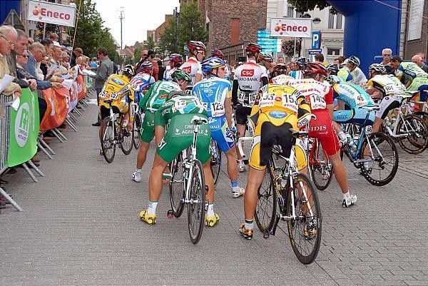 Riders await the start of stage six.