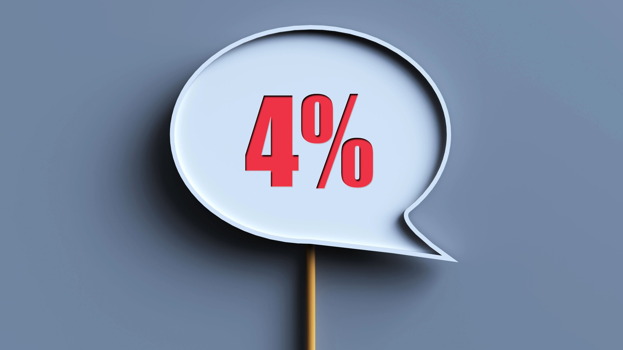 A sign in the shape of a speech bubble saying 4% in red