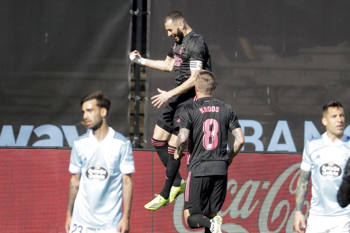 Karim Benzema scored twice as Real Madrid won their LaLiga trip to Celta Vigo.