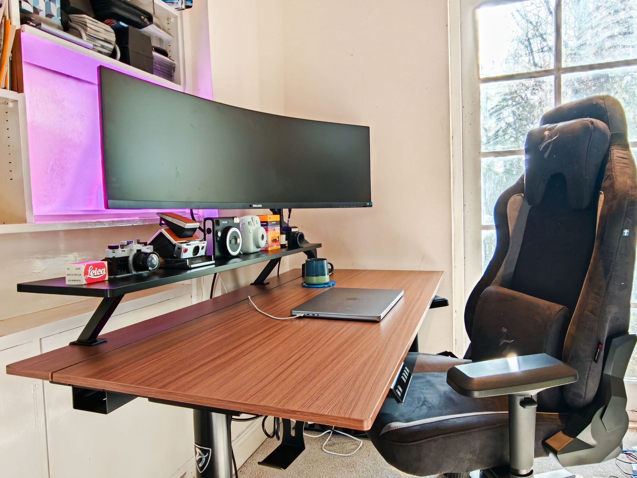 The Arozzi Arena Nordico Electric Standing Desk, freshly assembled, in home office room
