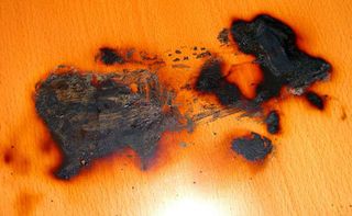 Burn mark left on the desk
