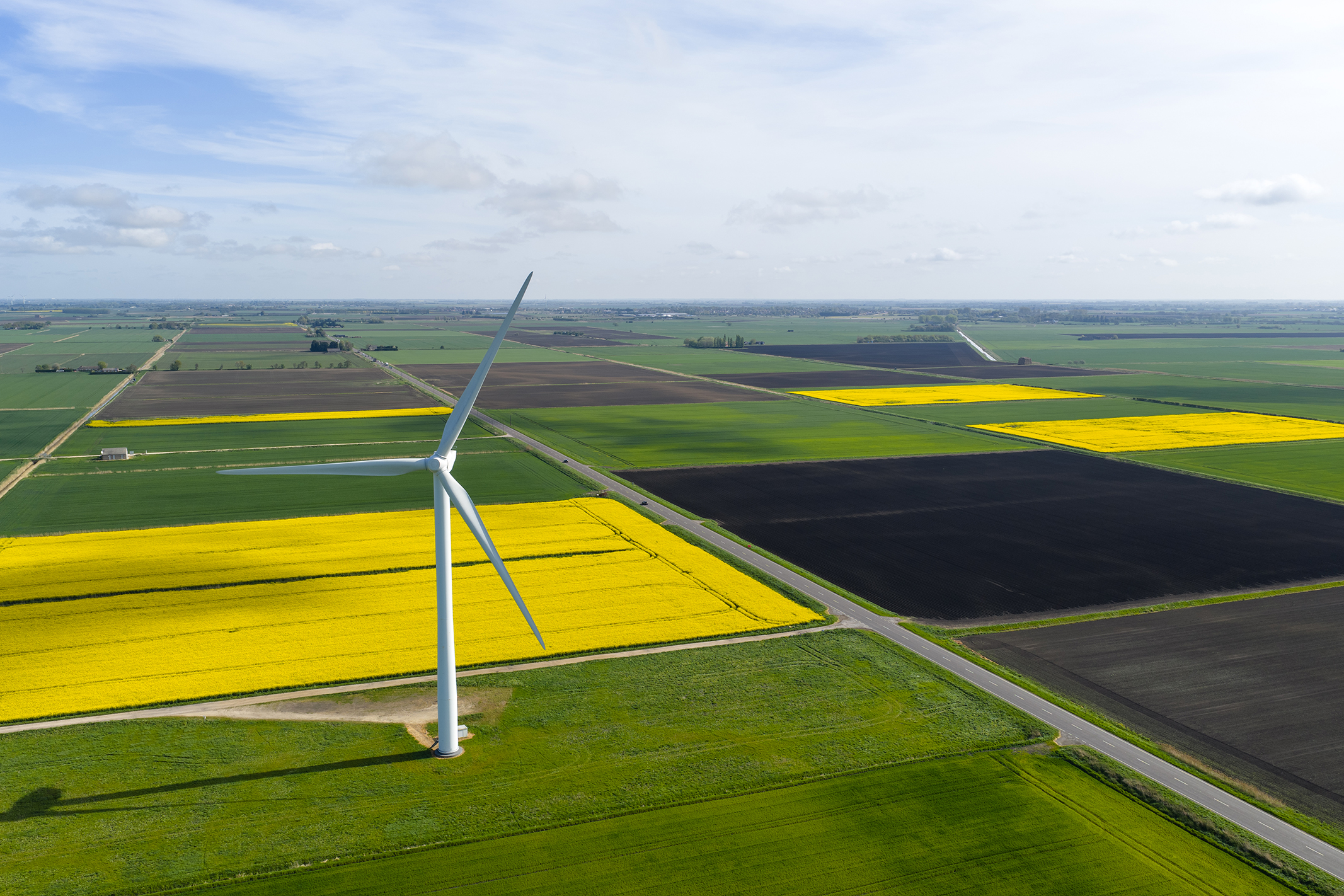 Photo of a wind turbine and fields taken with the DJI Mavic 4 Pro