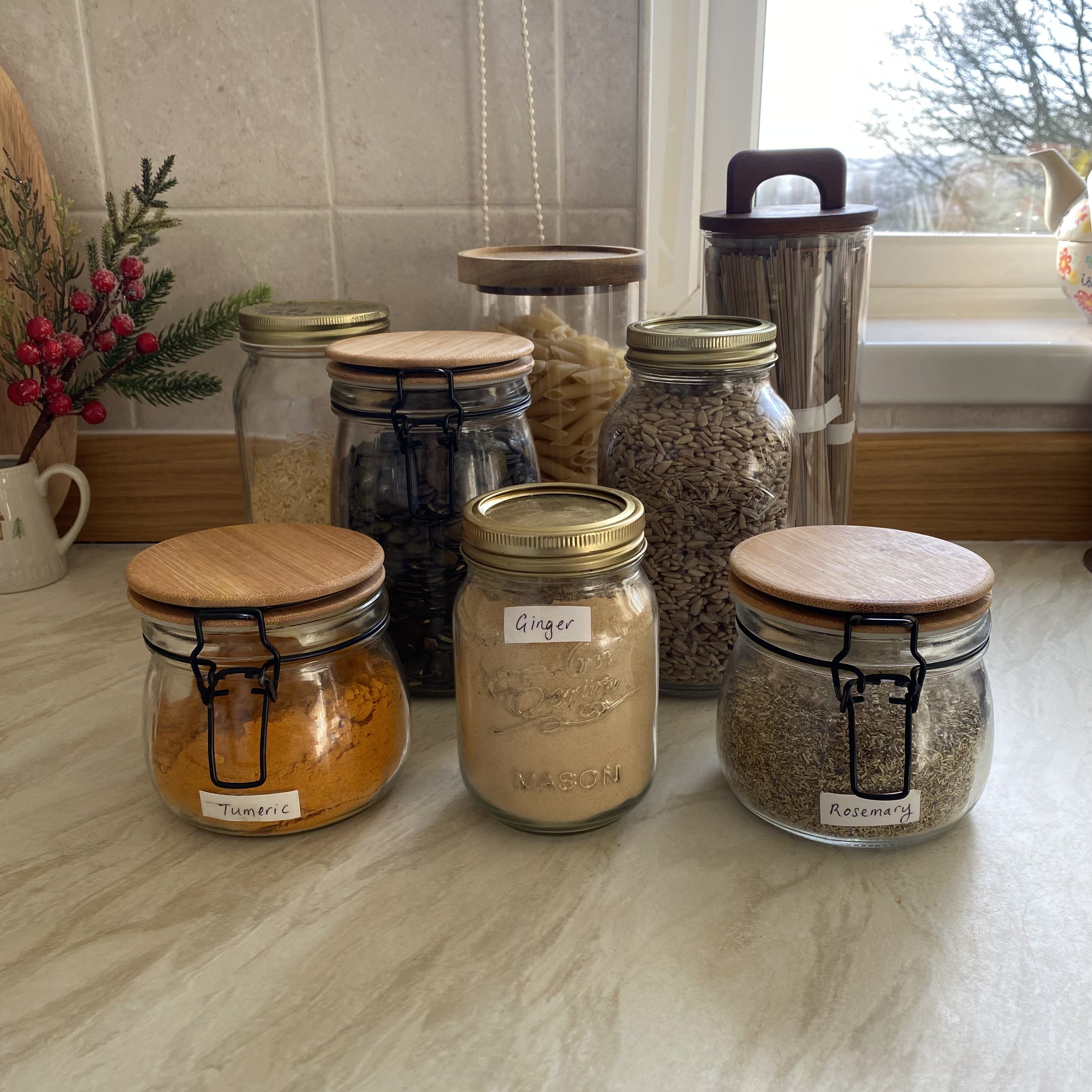 Katie trying visual decluttering - storage jars on kitchen worktop