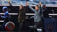Liam Gallagher and Noel Gallagher perform onstage at the Oasis Live '25 - Toronto concert at Rogers Stadium on August 24, 2025 in Toronto, Ontario. (Photo by Kevin Mazur/Getty Images)
