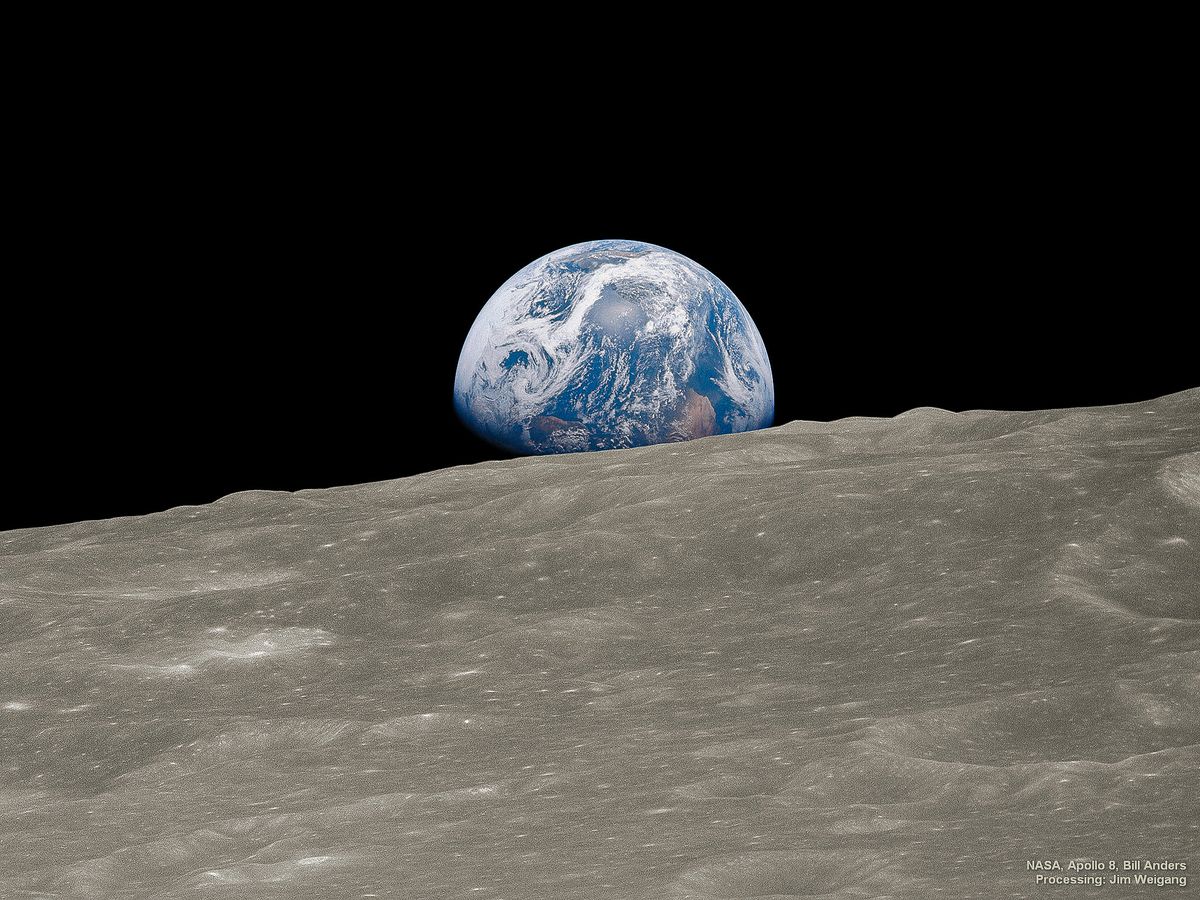 Earth rising above surface of the moon&#039;s surface - a photograph popularly known as Earthrise