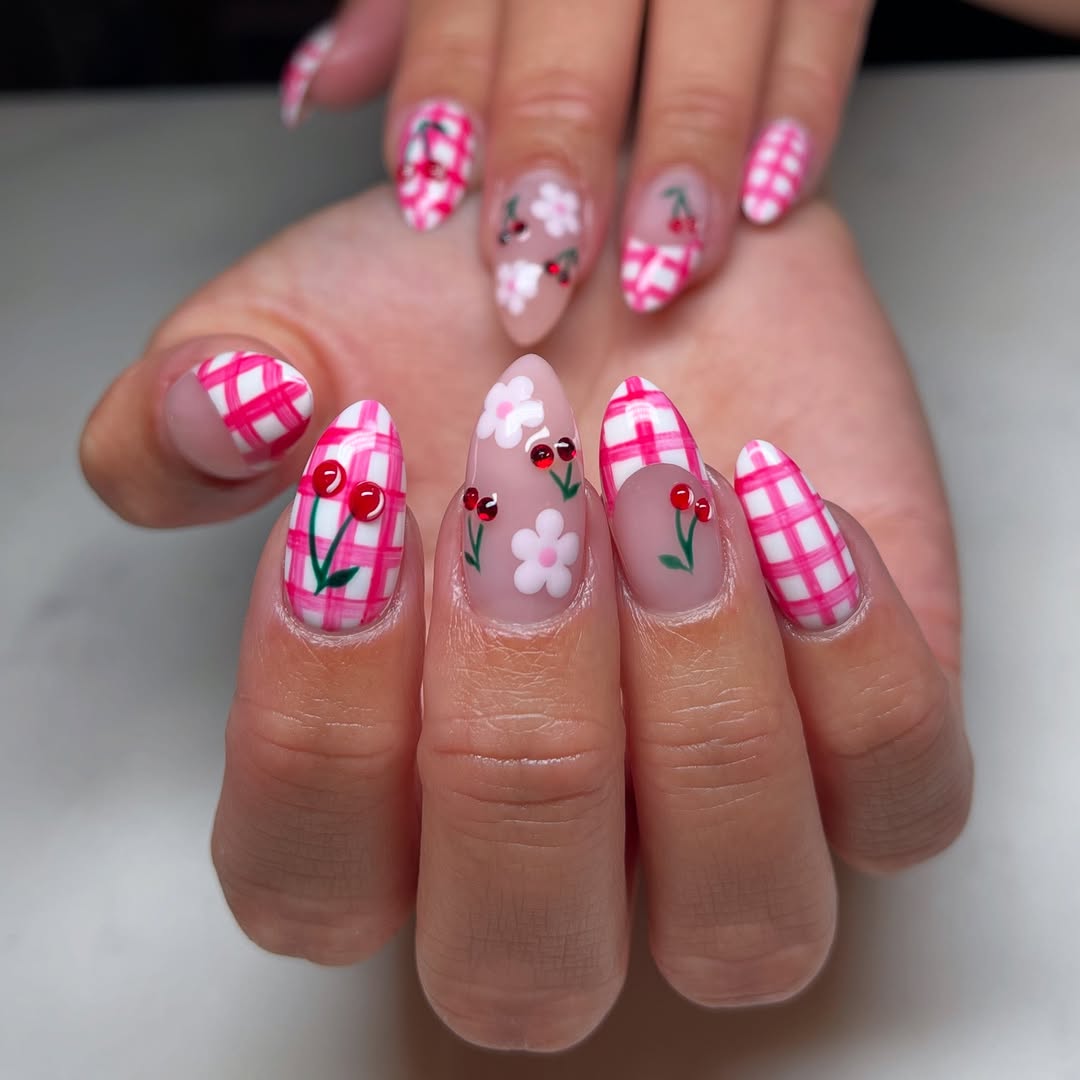 nude nails with cherries and pink stripes