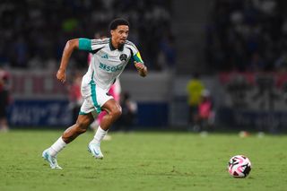 TOKYO, JAPAN - AUGUST 03: Jamal Lewis of Newcastle United runs with the ball during the J.LEAGUE International Series 2024 powered by docomo match between Yokohama F•Marinos and Newcastle United at National Stadium on August 03, 2024 in Tokyo, Japan. (Photo by Harriet Massey/Newcastle United via Getty Images)