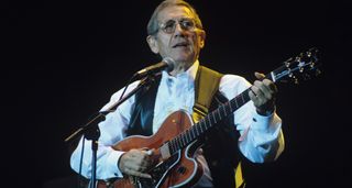 Chet Atkins onstage in 1993 playing his Gibson Country Gentleman