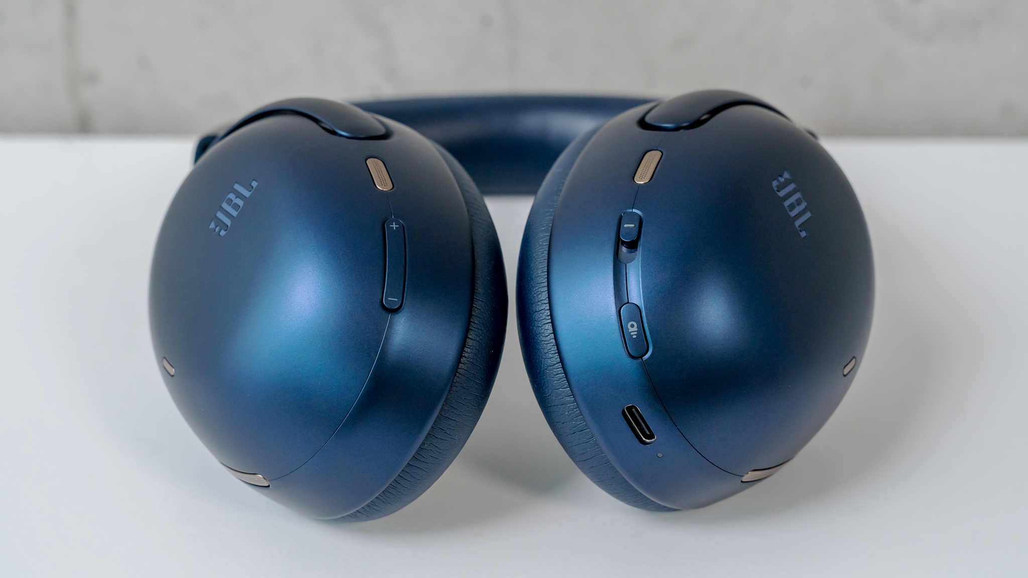 View of buttons and controls on JBL Tour One M3 earcups.