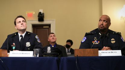 Metropolitan Police Department (MPD) Officer Daniel Hodges, and Harry Dunn, private first class with the U.S. Capitol Police, right, during a hearing for the Select Committee to Investigate the January 6th Attack on the U.S. Capitol 