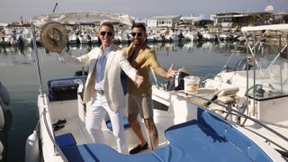 Anton and Giovanni: Adventures In Sicily on BBC1 sees the Strictly stars travelling together in a white boat both wearing summer suits.