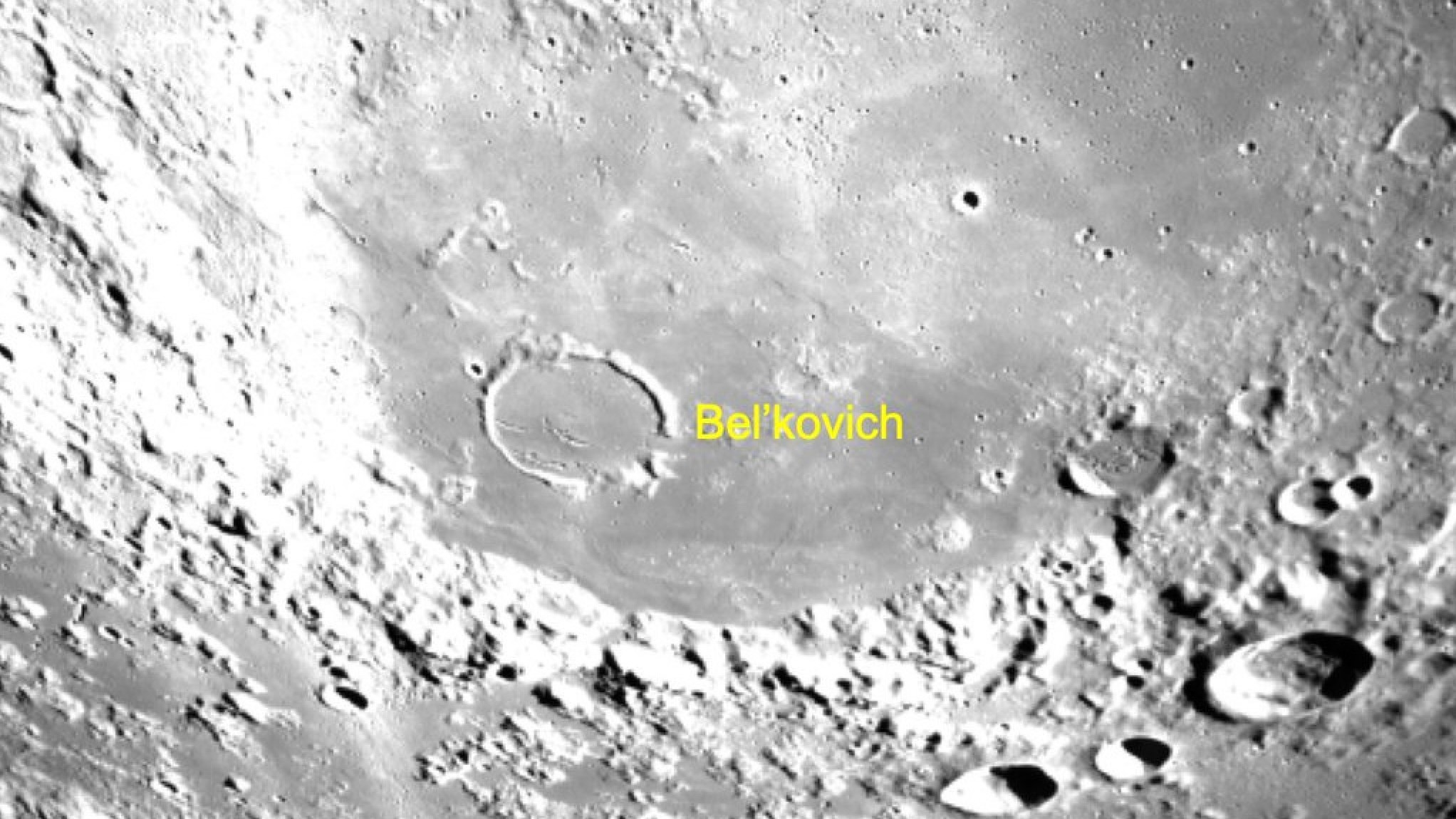 closeup of the moon's surface, showing numerous craters
