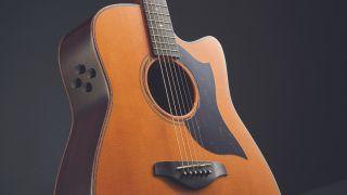 Close up of the body of a Yamaha electro-acoustic guitar