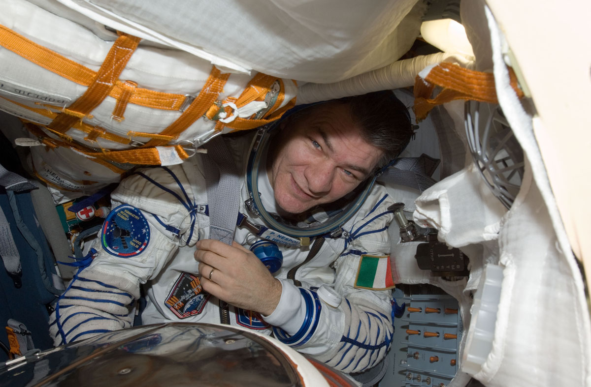 European Space Agency astronaut Paolo Nespoli, Expedition 27 flight engineer, attired in a Russian Sokol launch and entry suit, is pictured in the Soyuz TMA-20 spacecraft currently docked to the Rassvet Mini-Research Module 1 (MRM1) of the International S