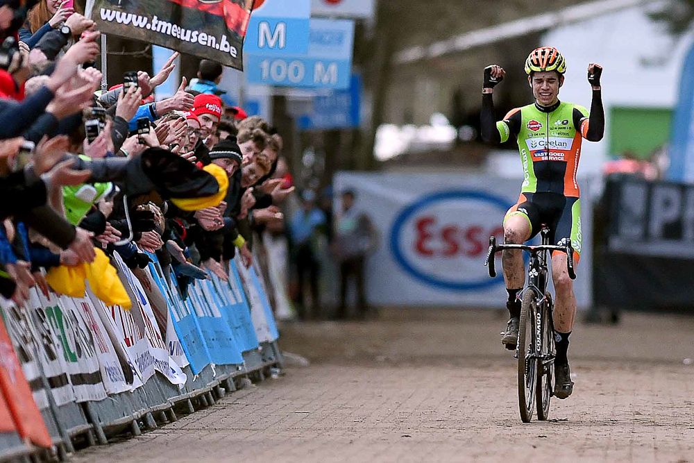 Wout Van Aert celebrates his 2016 Belgian cyclo-cross title.