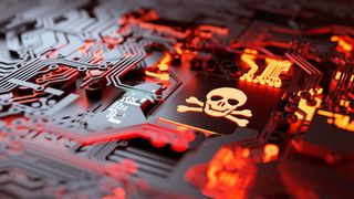 Ransomware concept image showing skull and cross bones on a computer chip sitting on a circuit board.