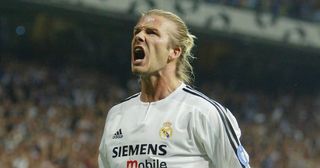 David Beckham of Real Madrid celebrates after the first goal during the UEFA Champions League Group F match between Real Madrid and Olympic Marseille at the Santiago Bernabeu Stadium on September 16, 2003 in Madrid, Spain.