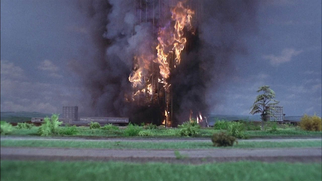 Screenshot from Thunderbirds showing the impressive visual effects of a building on fire.