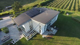 Hybrid solar panels installed on modern self build