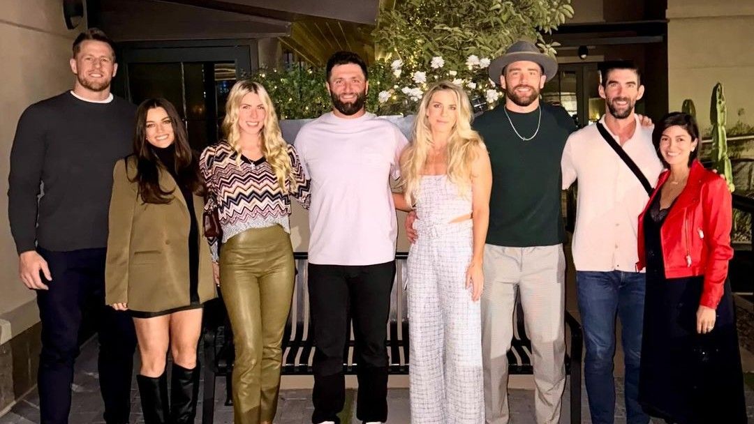 Jon Rahm enjoys a meal out with friends.