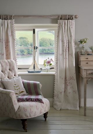 curtains with armchair and cushions
