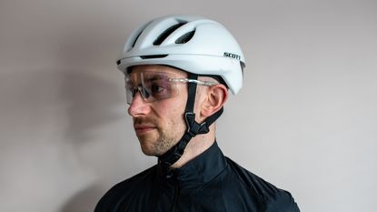 A man wearing a pair of crystal Galibier Grand Tour sunglases