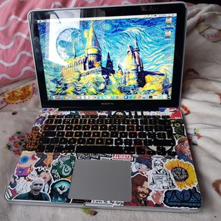 Macbook Pro Covered In Harry Potter Stickers