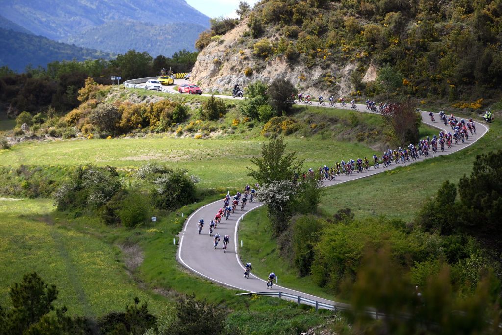 JACA SPAIN MAY 02 A general view of the peloton passing through a landscape during the 10th La Vuelta Femenina 2024 Stage 5 a 1139km stage from Huesca to Alto del Fuerte Rapitan Jaca 1103m UCIWWT on May 02 2024 in Jaca Spain Photo by Alex BroadwayGetty Images