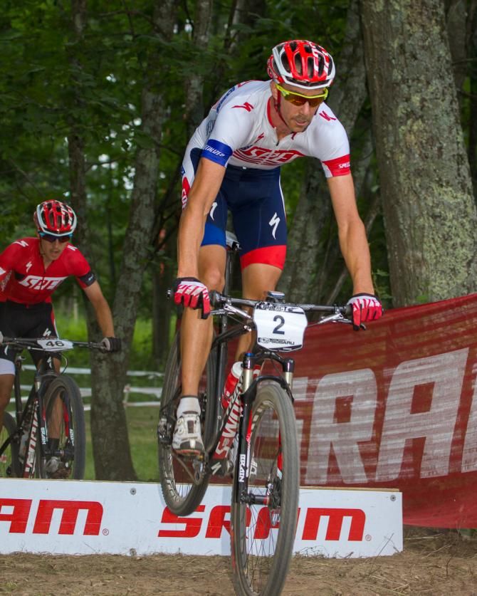 Todd Wells followed by Howard Grotts in the chase to catch the leaders.