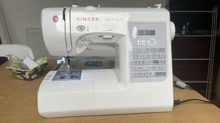 Singer Patchwork 7285Q review; a photo of a sewing machine on a desk