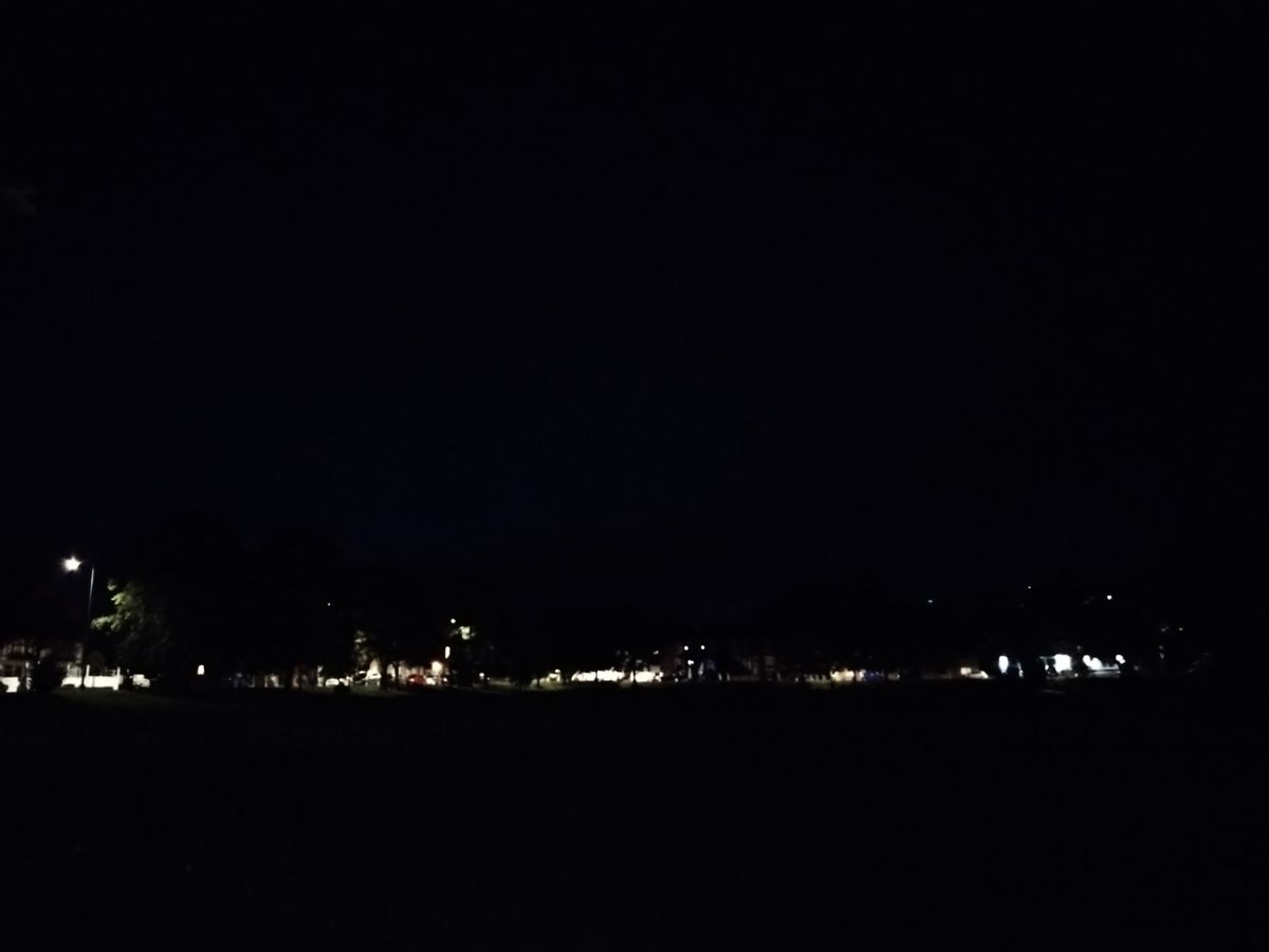Sony Xperia 10 IV camera sample showing an open green space in the dark