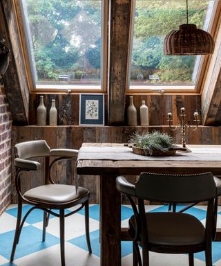 Lauren Gilberthorpe Interiors converted barn dining room with wood paneling