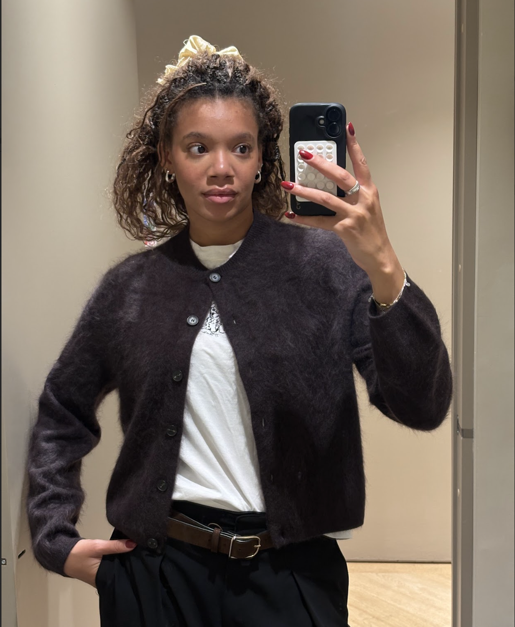 Fashion editor Imani wears the cos expensive looking knitwear.