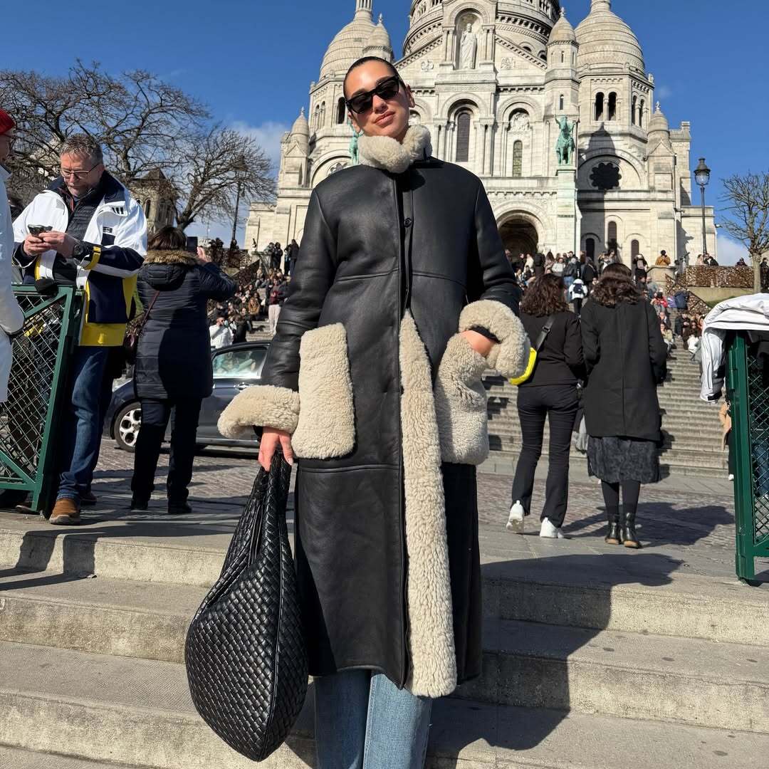 Dua Lipa wore her oversize Bottega Veneta maxi bag as a laptop bag