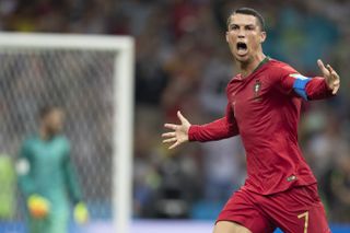 Cristiano Ronaldo celebrates after scoring a hat-trick for Portugal against Spain in the 2018 World Cup in Russia.