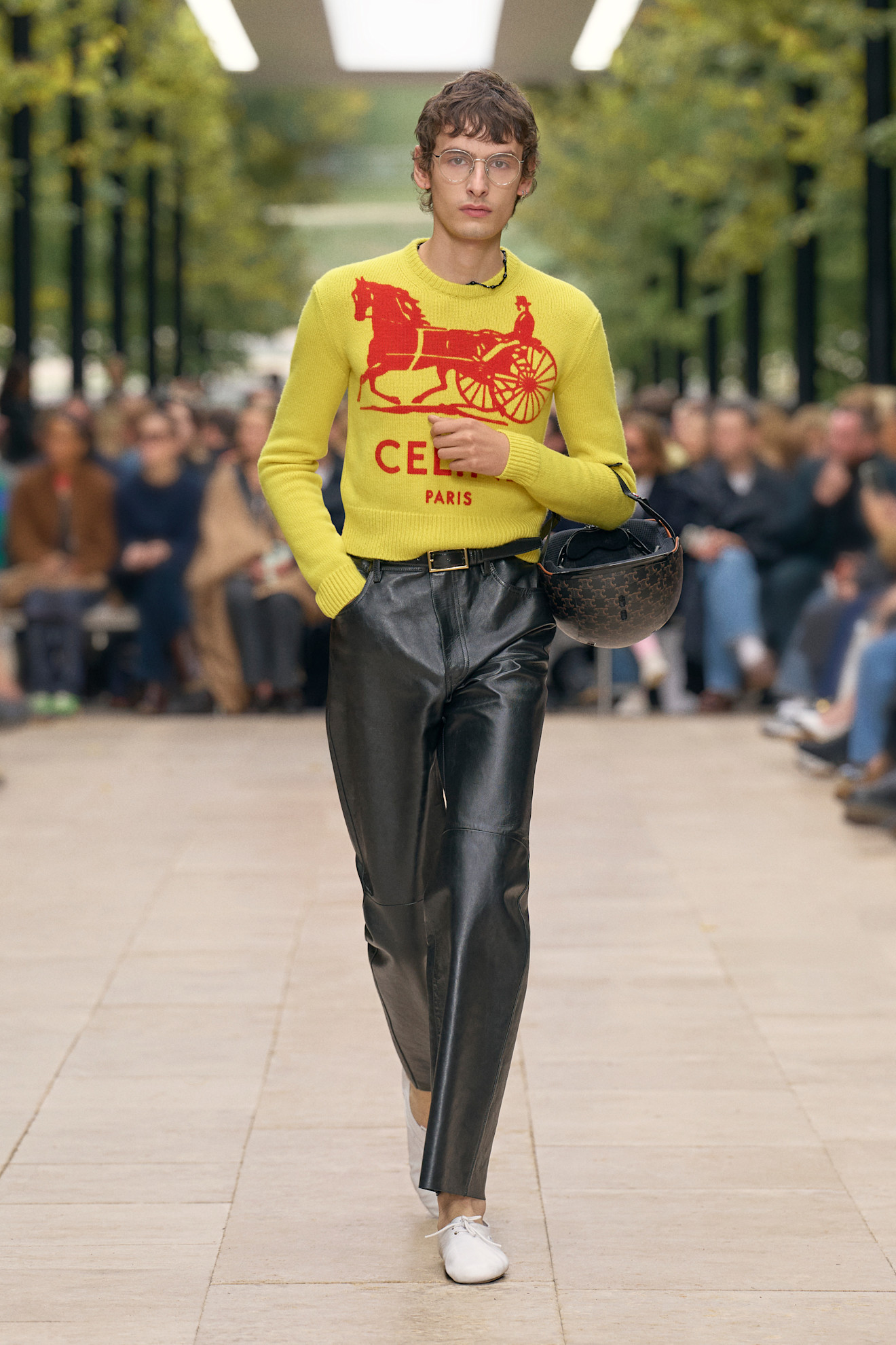 A model wore the black-and-yellow color combination on Celine's Spring 2026 runway