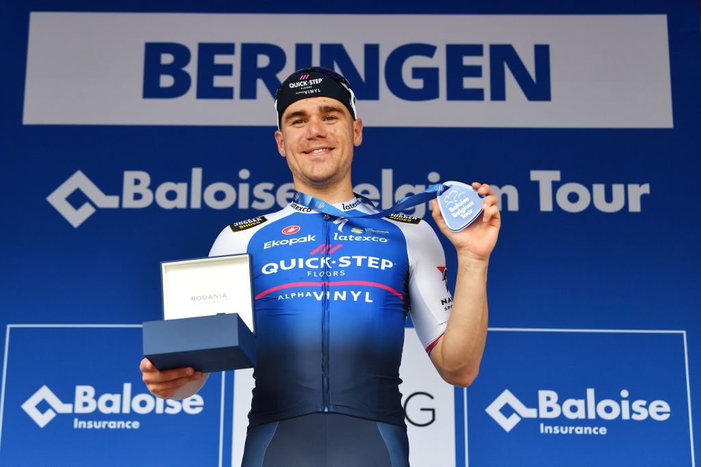 BERINGEN BELGIUM JUNE 19 Fabio Jakobsen of Netherlands and Team QuickStep Alpha Vinyl celebrates winning the stage on the podium ceremony after the 91st Baloise Belgium Tour 2022 Stage 5 a 1799km stage from Gingelom to Beringen BaloiseBelgiumTour on June 19 2022 in Beringen Belgium Photo by Luc ClaessenGetty Images